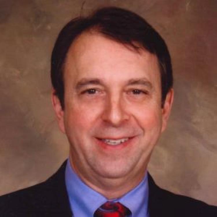 Dr.  Bradley Stoner
